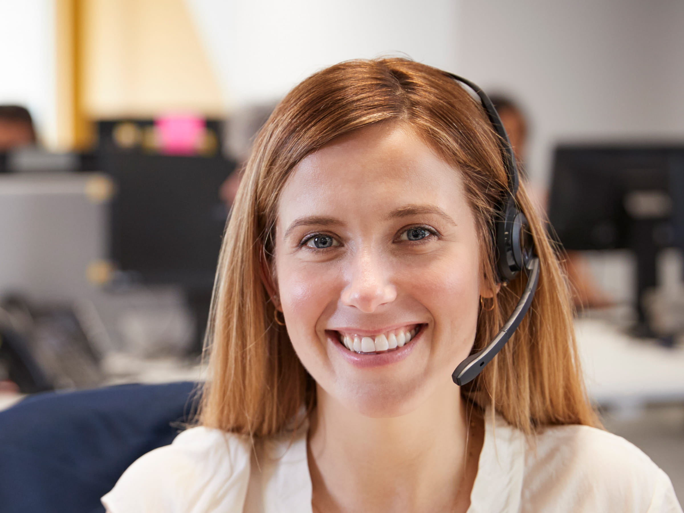 Smiling call centre agent